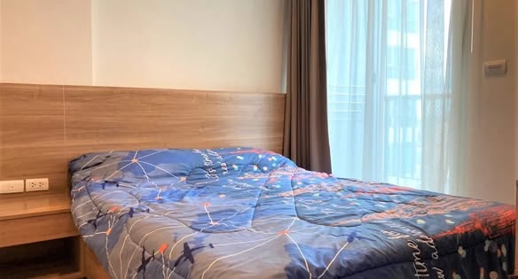 bedroom of RHYTHM Sathorn