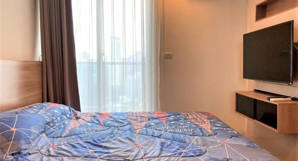 bedroom of RHYTHM Sathorn