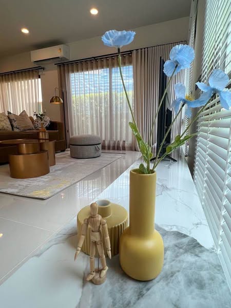 living room and bathroom of Burasiri Krungthep Kreetha