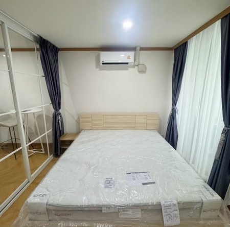 bedroom of Supalai Place Condominium Sukhumvit 39