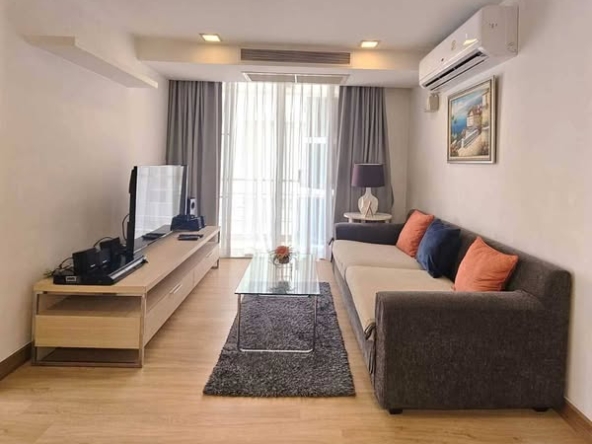 bedroom and living room of The Alcove 49