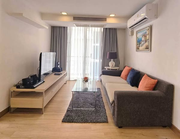 bedroom and living room of The Alcove 49