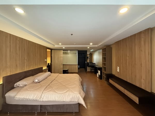 bedroom of The Trendy Condominium