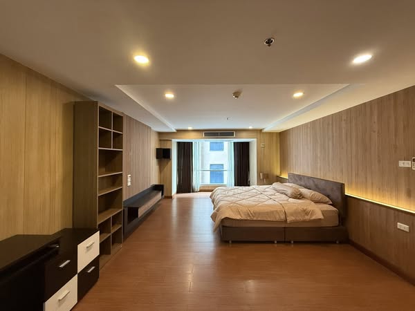 bedroom of The Trendy Condominium