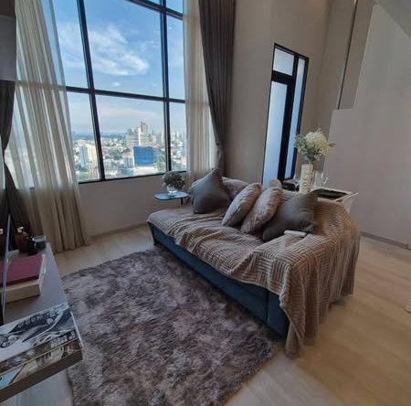 living room and bedroom of KnightsBridge Prime Sathon