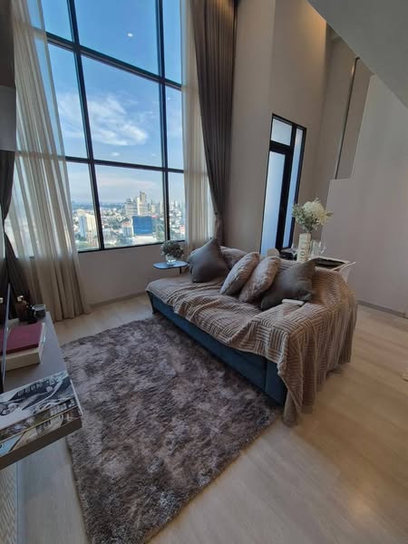 living room and bedroom of KnightsBridge Prime Sathon