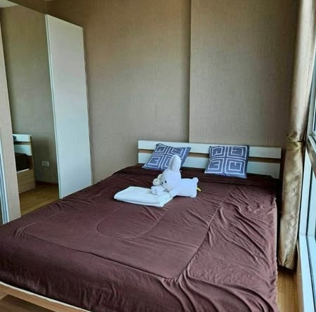 bedroom of One Plus Nineteen 4 Condominium