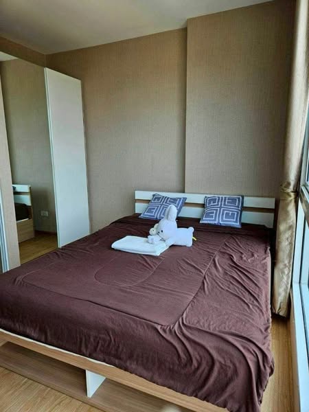 bedroom of One Plus Nineteen 4 Condominium
