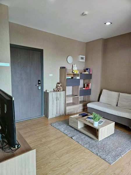 living room and bedroom of One Plus Nineteen 4 Condominium