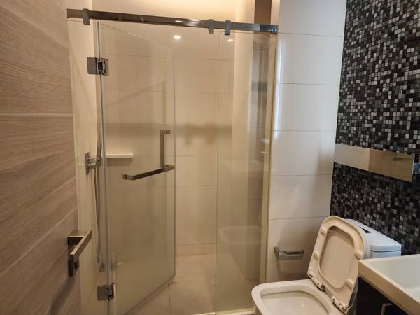 room interior and bathroom of The Room Sathon @ St. Louis
