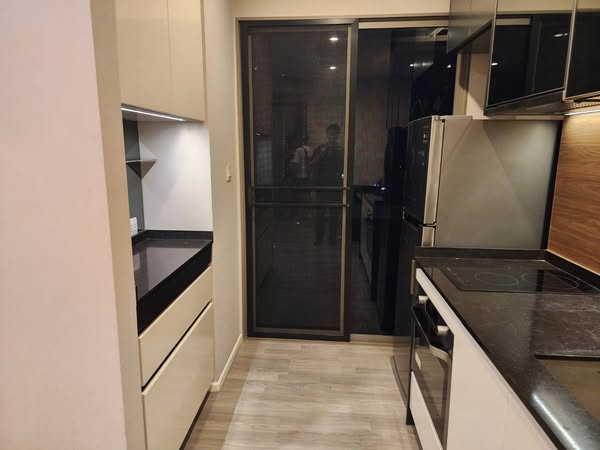 room interior and kitchen of The Room Sathon @ St. Louis