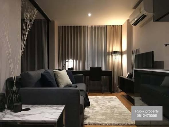 bedroom and living room and room interior of Altitude Sam Yan – Si Lom