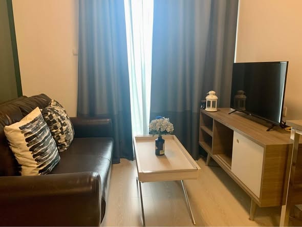 living room and bedroom of Chapter One Eco Ratchada-HuaiKhwang