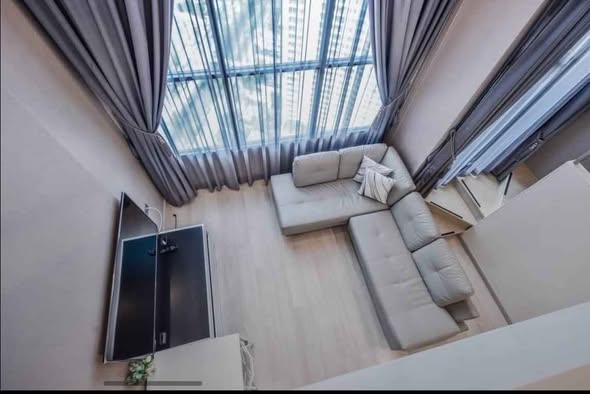 living room and bedroom of KnightsBridge Prime Sathon