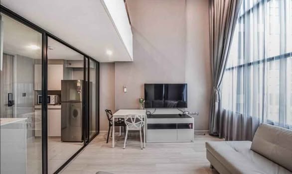 living room and bedroom of KnightsBridge Prime Sathon