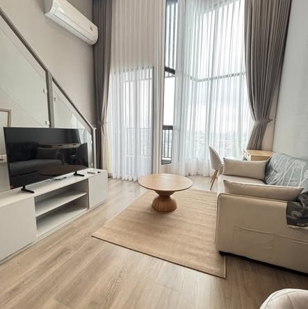 living room and bedroom of KnightsBridge Space Sukhumvit-Rama 4