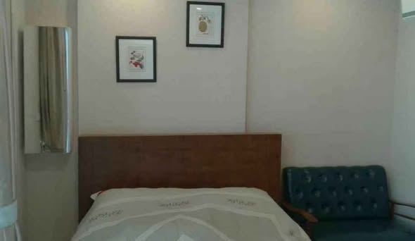 bedroom of Metro Luxe Rama 4