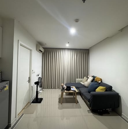 bedroom and living room of TC-Green Condominium