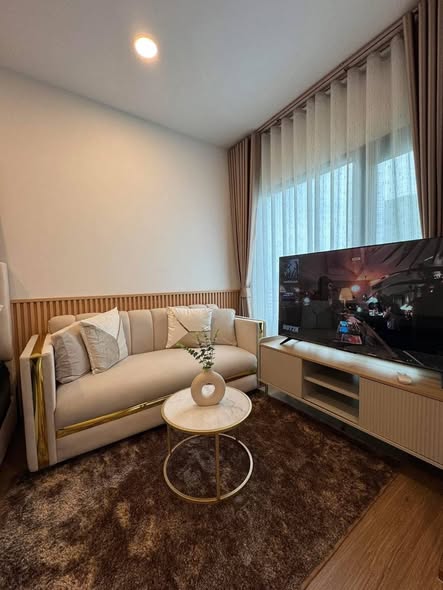 bedroom and living room of The Livin Ramkhamhaeng : เดอะ ลิฟวิ่น รามคำแหง