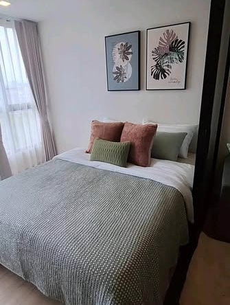 bedroom of Atmoz รัชดา-ห้วยขวาง คอนโด