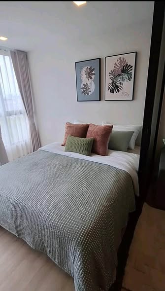 bedroom of Atmoz รัชดา-ห้วยขวาง คอนโด