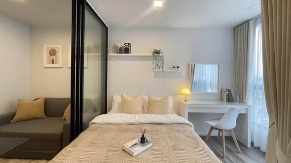 bedroom of Atmoz รัชดา-ห้วยขวาง คอนโด