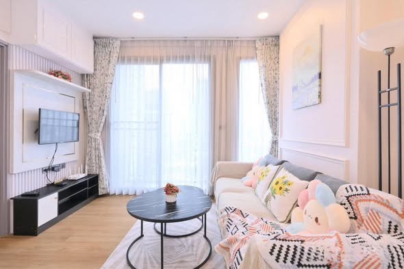 bedroom and living room of CEIL By Sansiri