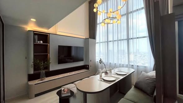 living room and bedroom of KnightsBridge Prime Sathon