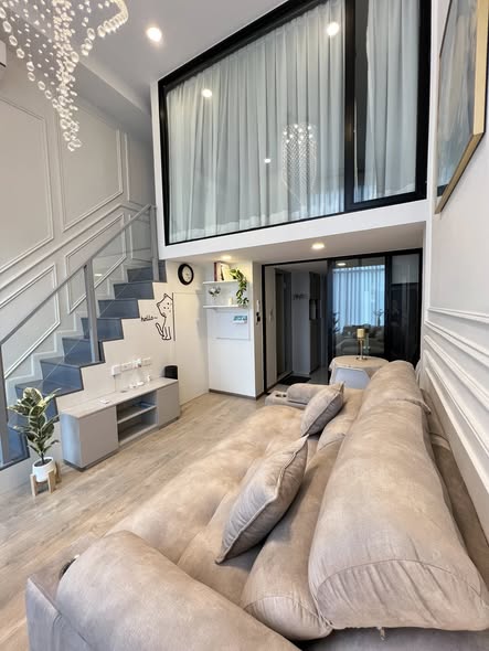 living room and bedroom of SOHO​ BANGKOK​ RATCHADA​