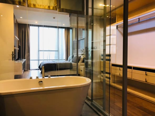 room interior and bathroom of The Bangkok Sathorn