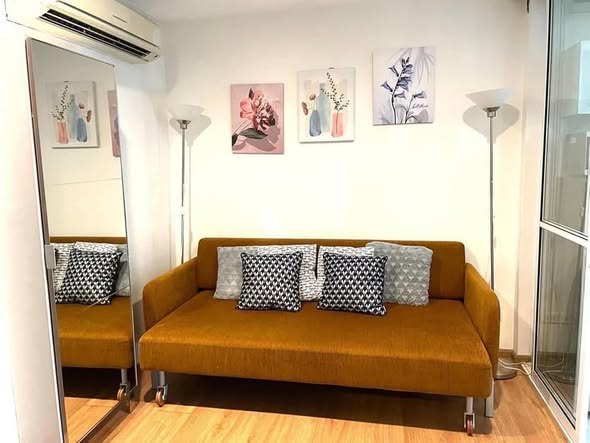 living room of THE BASE Sukhumvit 77