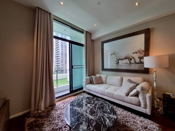 bedroom and living room of The Diplomat 39