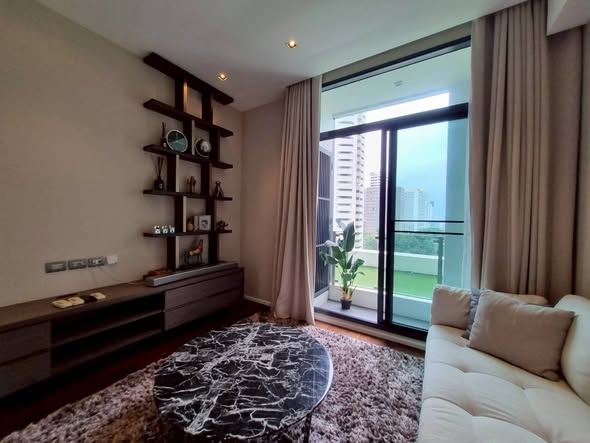 living room and bedroom of The Diplomat 39