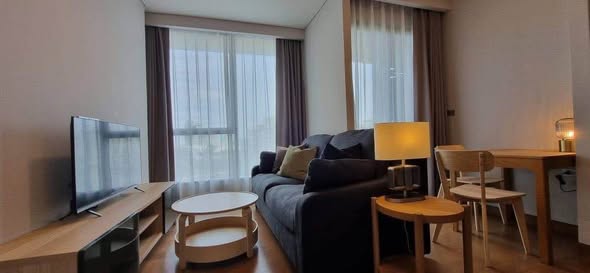 living room and bedroom of The Lumpini 24