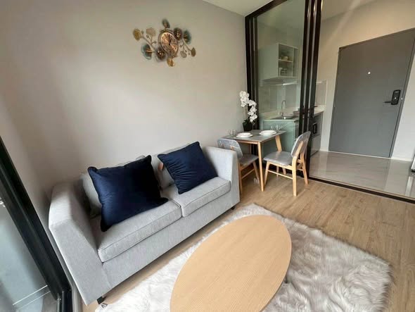 living room and bedroom of The Next Ruamchok – City Hall