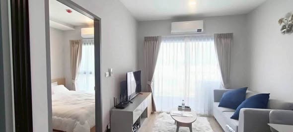 living room and bedroom of The Next Ruamchok – City Hall