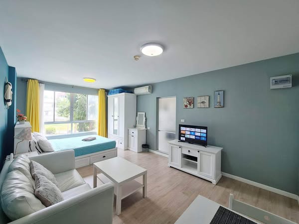 bedroom and living room of Baan Peang Ploen Condonium by Yongwisut