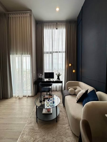 living room of Origin Plug & Play Nonthaburi Station