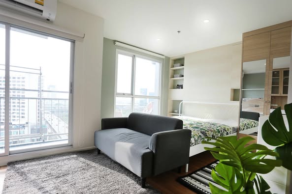 bedroom and living room of The Selected Kaset-Ngamwongwan by LPN