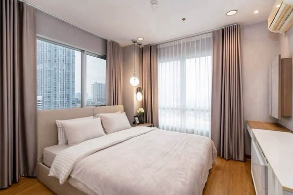 bedroom of MB Grand Residence