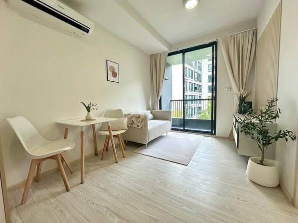 bedroom and living room of My Story Condo