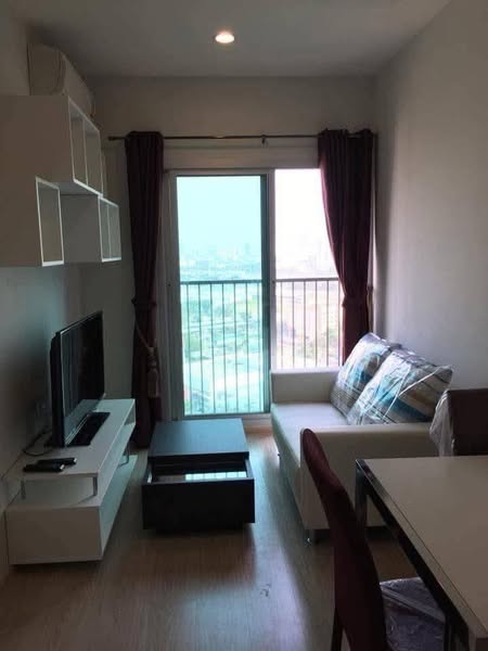 bedroom and living room of Noble Revolve Ratchada 1