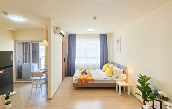 bedroom and living room of Plum Condo Samakkhi