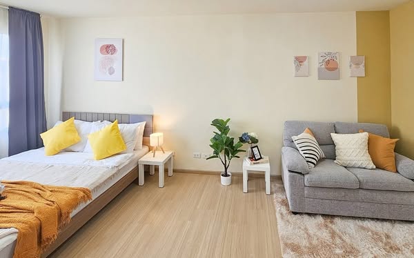 living room and bedroom of Plum Condo Samakkhi