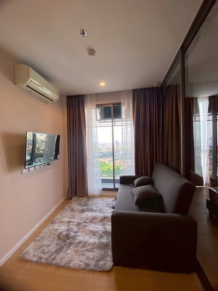 living room and bedroom of The Cuvee Tiwanon