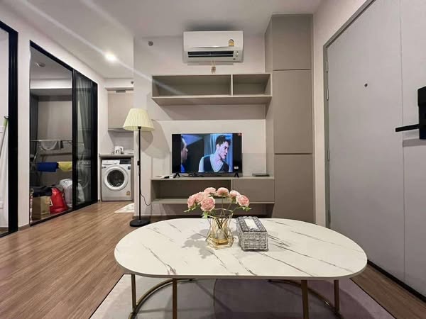 bedroom and living room of The Origin Ram 209 Interchange