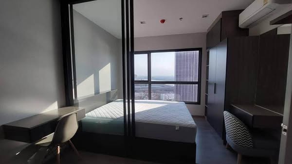 bedroom of The Politan Aqua