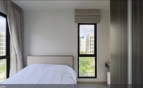 bedroom and room interior of UNiO Sukhumvit 72