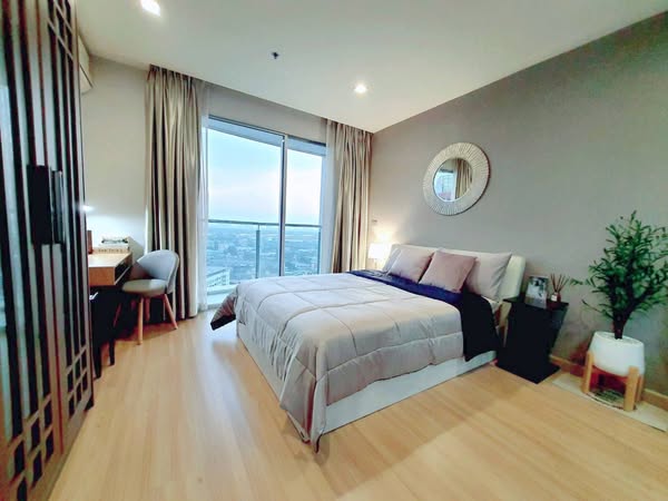 bedroom of Sky Walk Residences