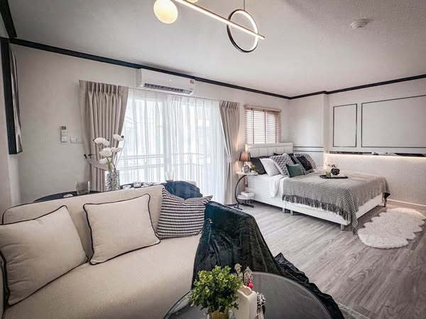 bedroom and living room of The Escape Condominium – ดิ เอสเคป คอนโดมิเนียม